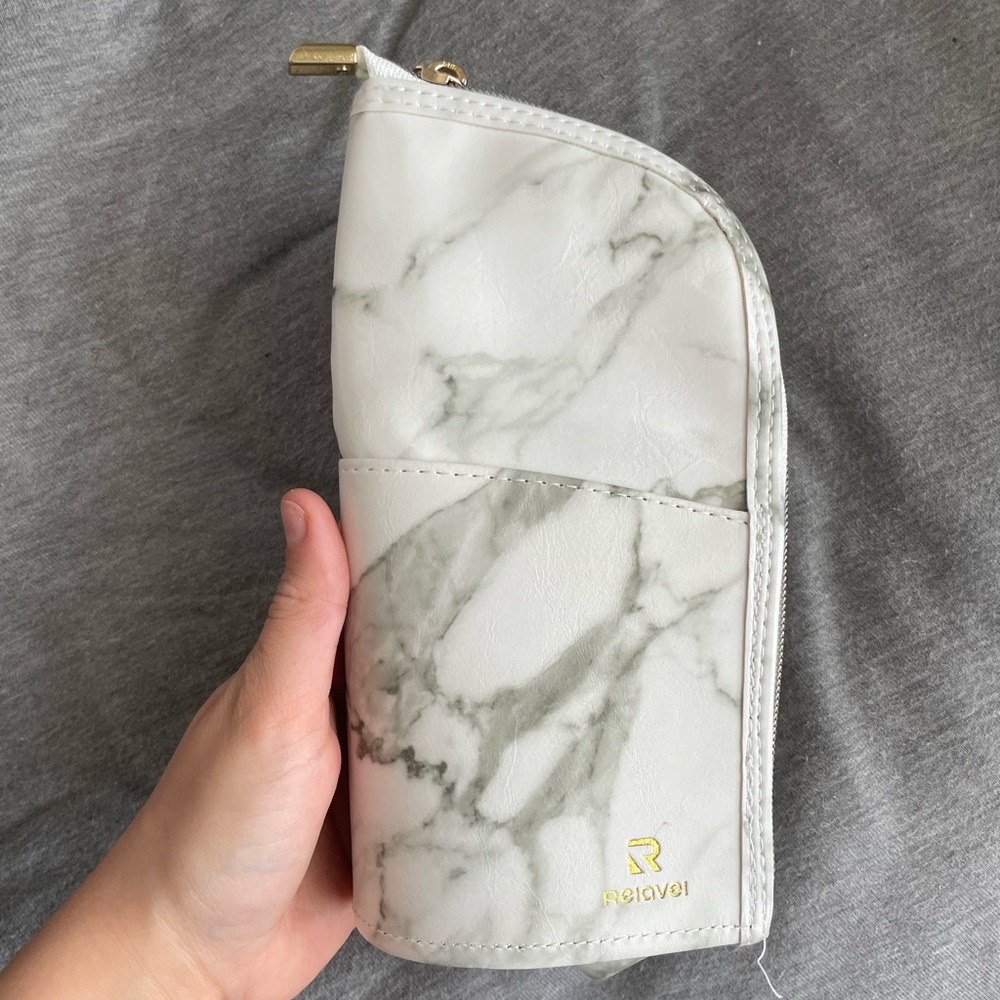 Makeup bag with brush holders. Great and stylish for on the go looks